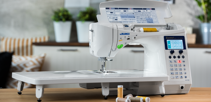 Juki home sewing machine with extended surface work table