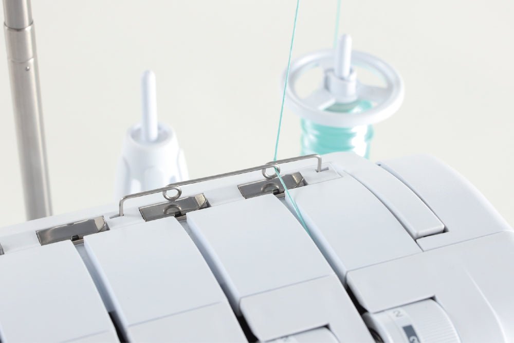 Close-up of Juki MO-80CSB threading