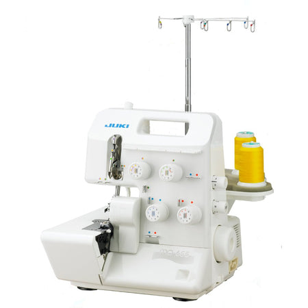 White Juki MO-655 sewing machine with threading system on a white background