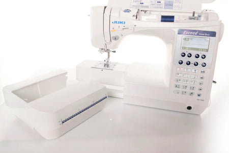 Juki Exceed HZL-F300 with open panel and removable work surface