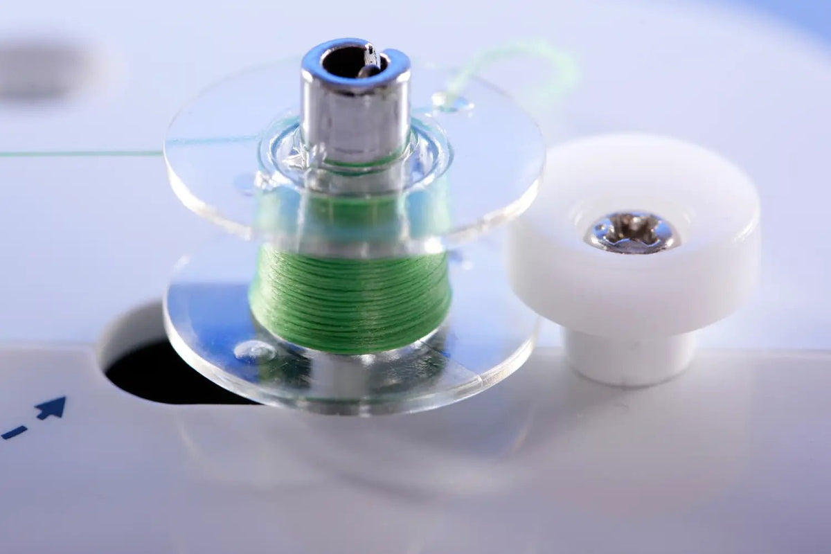 close up of thread spool on a juki HZL-355ZW-A