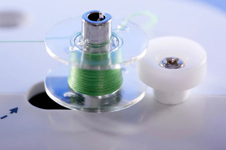 close up of thread spool on a juki HZL-355ZW-A