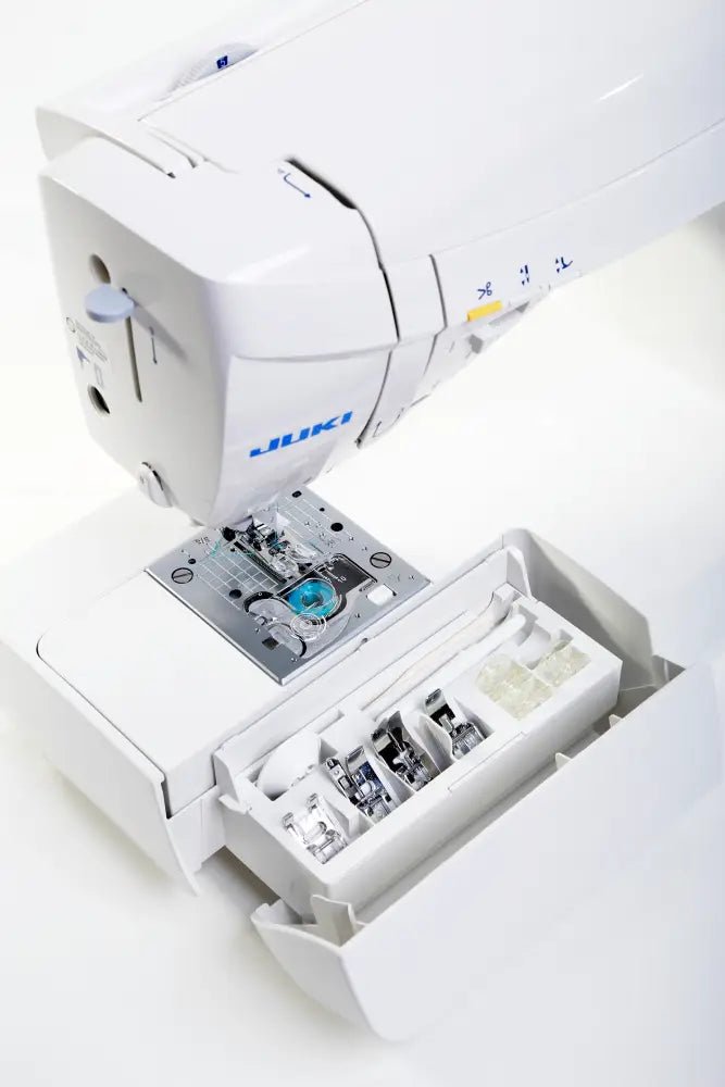Juki HZL-DX5 needle plate and open storage compartment 