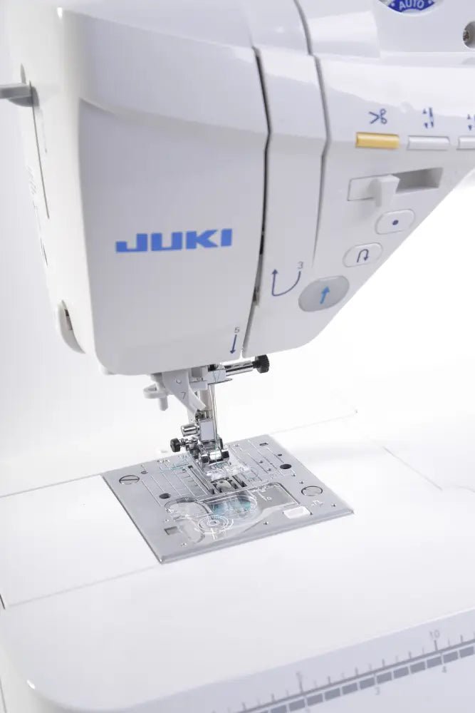 Close-up of a Juki HZL-DX5 on a white background