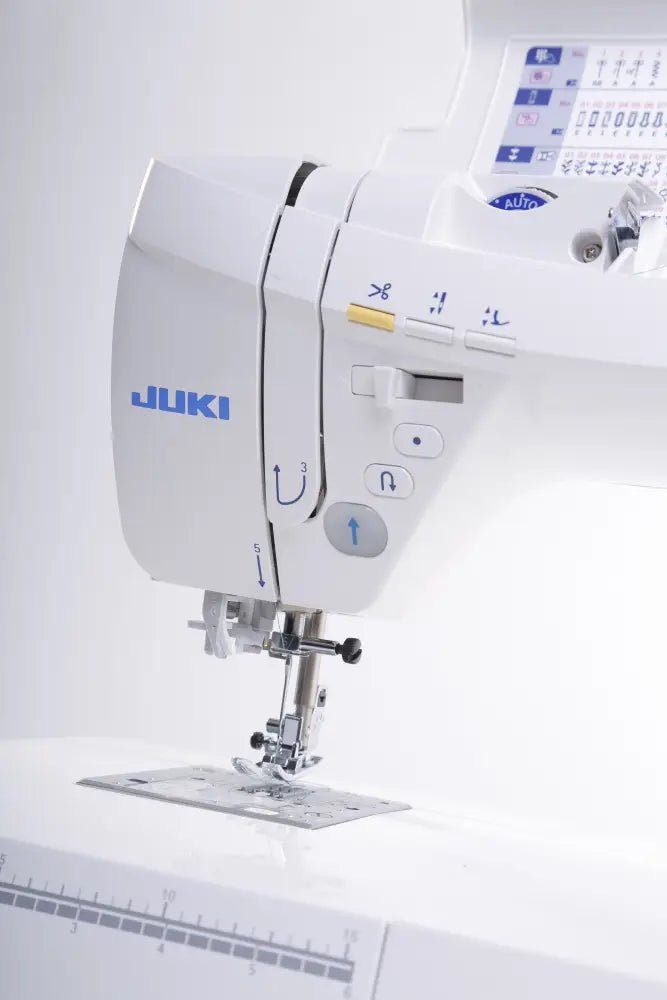Close-up of a Juki HZL-DX5 on a white background
