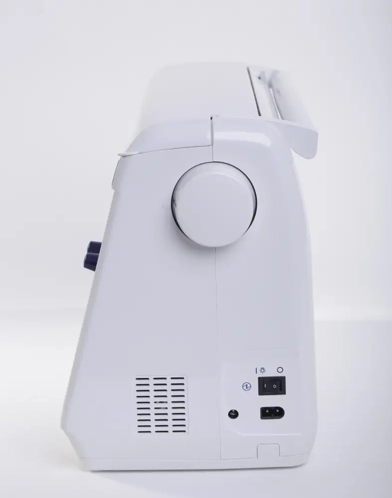 back view of a Juki HZL-DX7 showing power button and power input