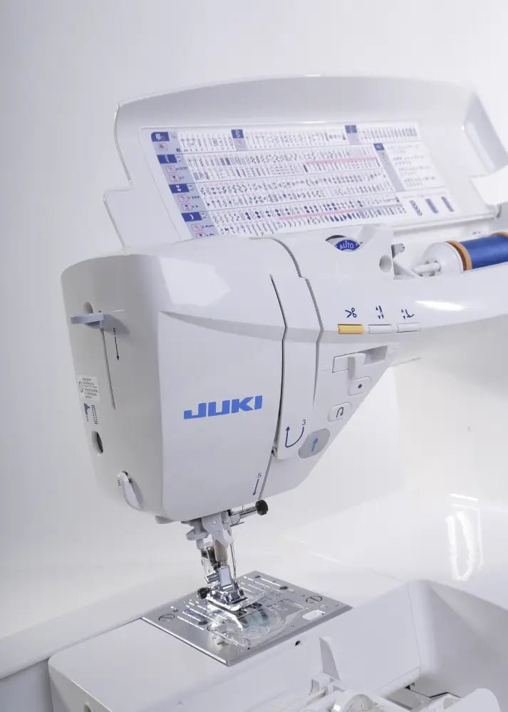 Juki HZL-DX7 with open thread spool panel