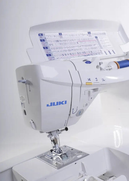 Juki HZL-DX7 with open thread spool panel