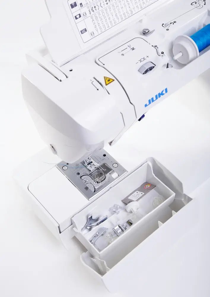 open accessory storage panel on a Juki HZL-G220