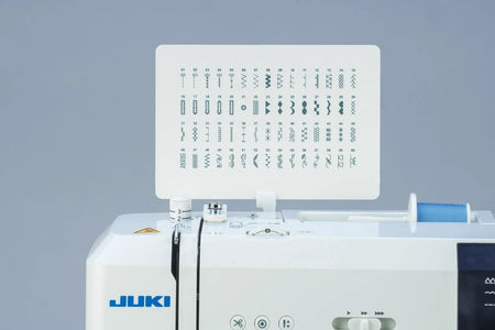 close-up of a Juki HZL-HT710 decorative stitch plate with available panels