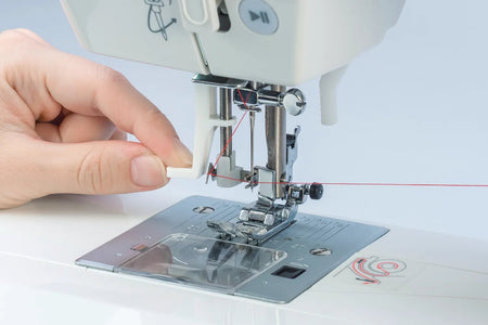 close-up of a Juki HZL-HT740 automatic needle threader