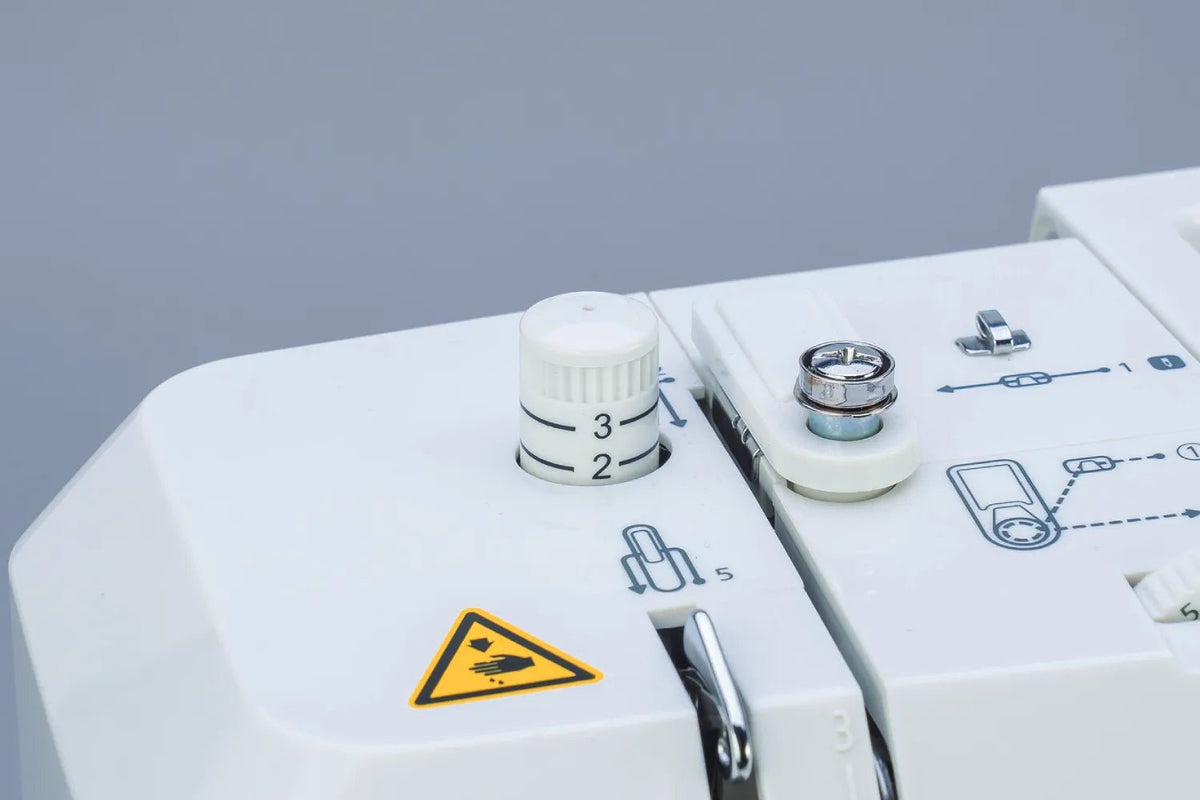 close-up of a Juki HZL-HT740 in foot pressure controls