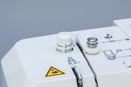 close-up of a Juki HZL-HT740 in foot pressure controls