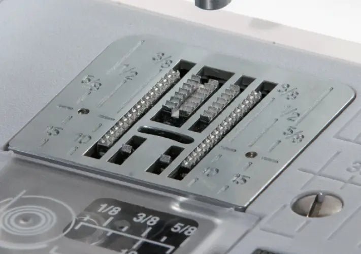 close-up of a Juki HZL-LB5100 7 point feed dog