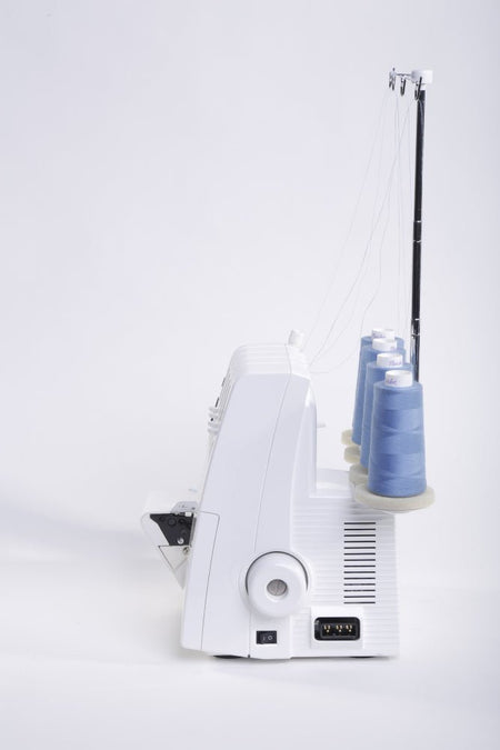 side view a Juki MO-104D showing power button and supply plug-in