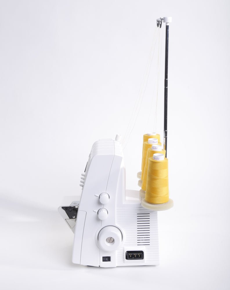 side view of a Juki MO-114D showing power button and supply plug in 