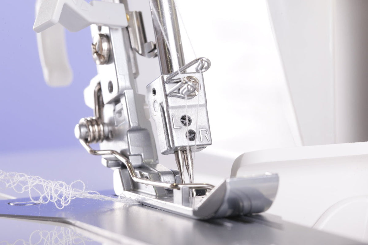 Close-up of a Juki MO-1000 sewing machine needle and presser foot