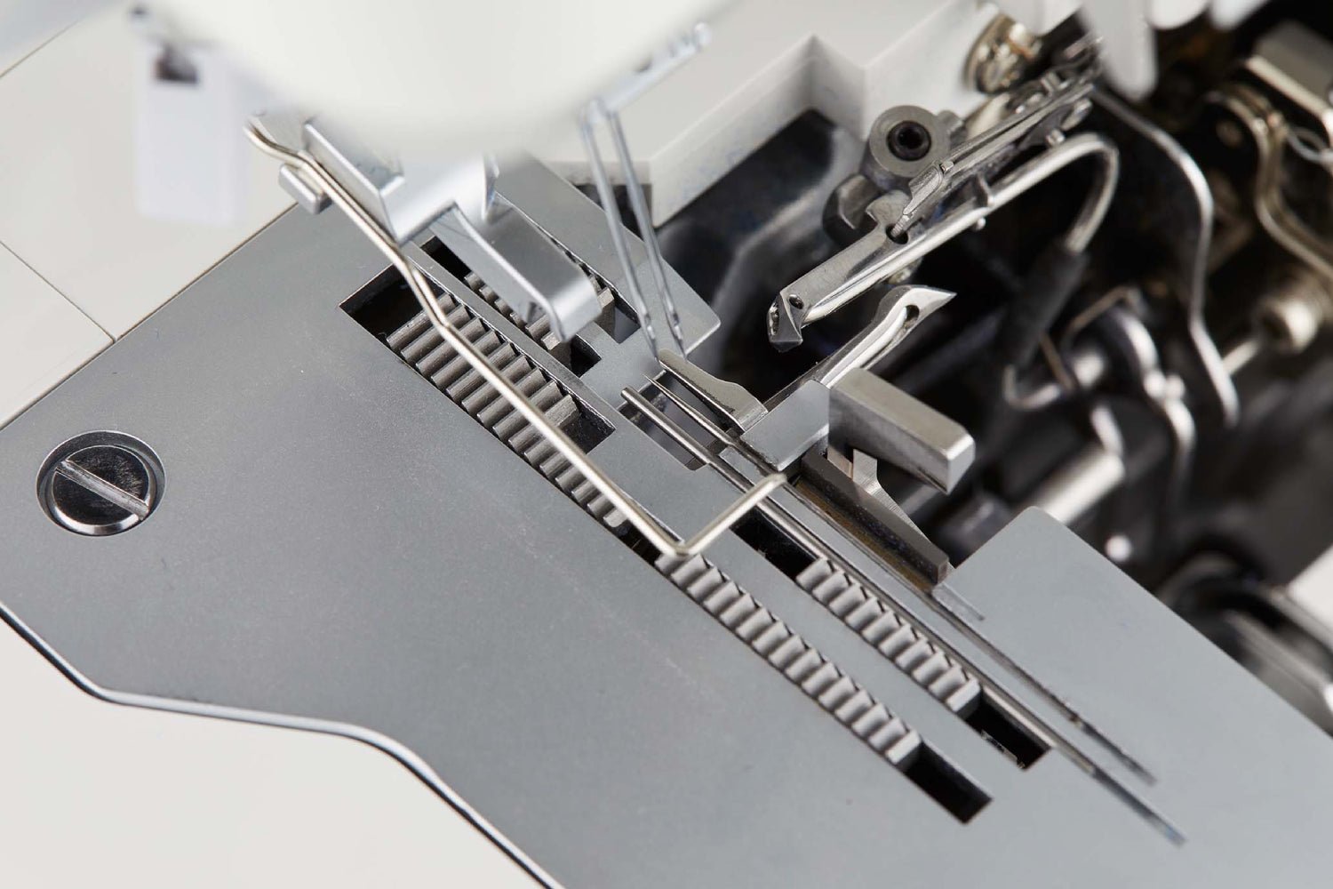 Close-up of a Juki MO-2800  sewing machine needle and mechanism