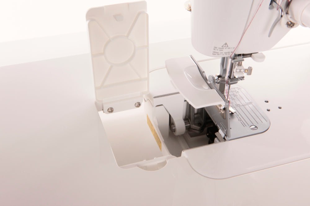 Close-up of a Juki TL-2000Qi sewing machine with a foot plate 